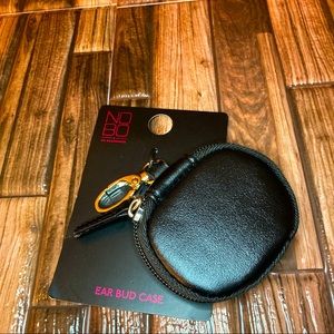 Black faux leather air pod case.